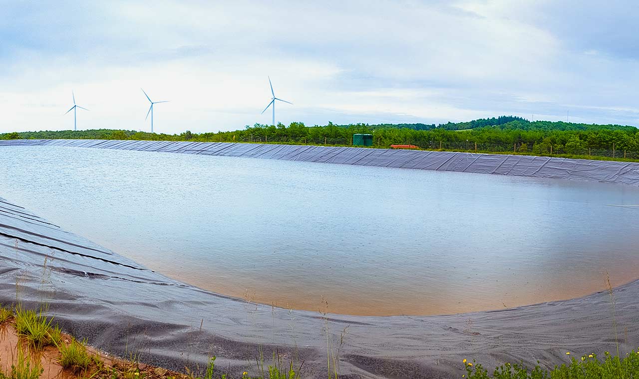 A produced water containment pond